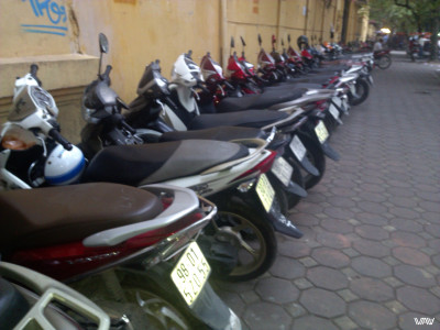 I love how they park motorcycles in Hanoi, Vietnam
