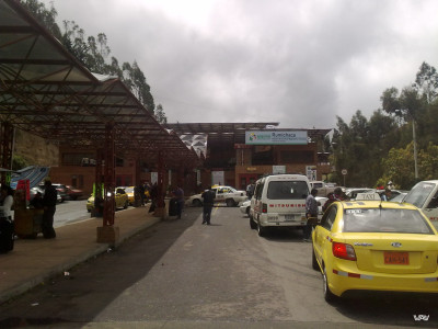 Taxi drives people from bus station in Ipiales to Columbian border checkpoint